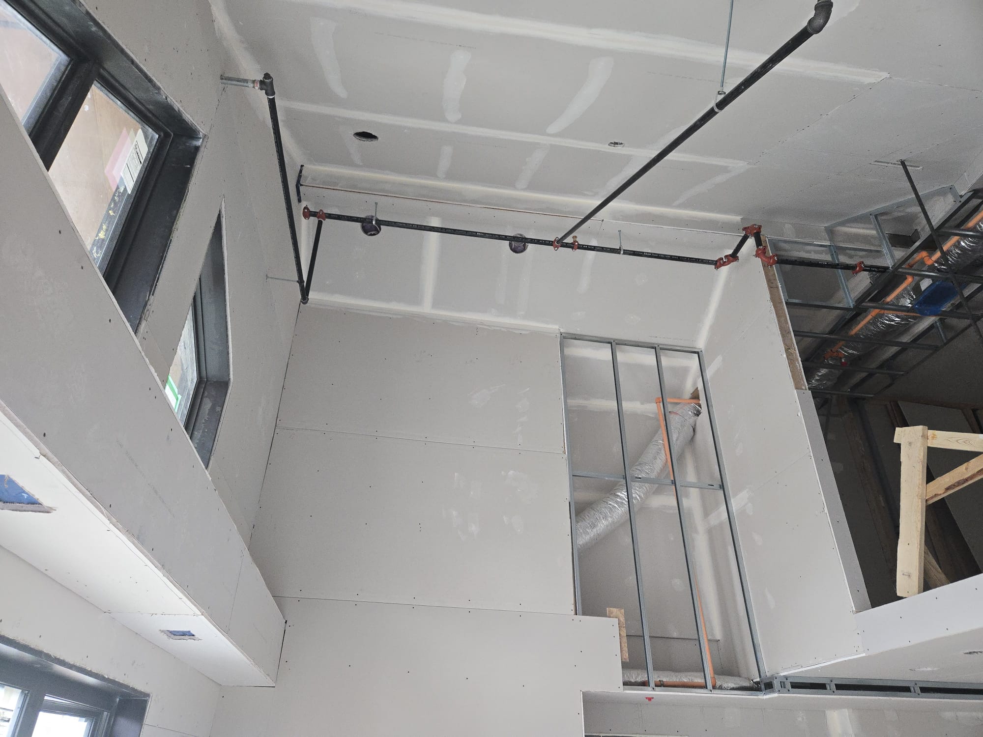 Drywall installation in progress